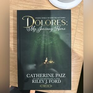 Hardcover - Dolores: My Journey Home by Catherine Paiz